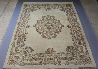 A white ground and floral patterned Indian carpet with central floral medallion 367cm x 278cm
