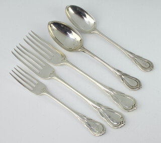 A Victorian silver lily pattern table fork London 1856, 2 other forks and 2 dessert spoons 364 grams 