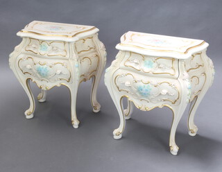 A pair of Rococo style cream and gilt floral painted chests of bombe form and serpentine outline fitted 2 long drawers, raised on cabriole supports 63cm h x 60cm w x 32cm d 