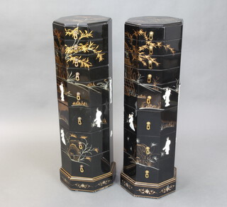 A pair of 20th Century octagonal Chinese lacquered pedestal chests of 8 drawers, decorated with carved mother of pearl figures of geishas, 101cm h x 31cm w x 31cm d 
 