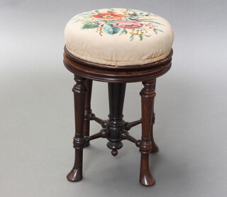 Brooks Ltd., a Victorian rosewood adjustable piano stool with floral woven woolwork seat, raised on club supports with X framed stretcher 48cm x 33cm, the base marked 18534 1004 Brooks Ltd. 