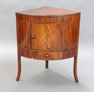 A Georgian inlaid mahogany bow front corner washstand with hinged top revealing 4 bowl recepticals, the base enclosed by a panelled door fitted a drawer, raised on outswept supports 81cm when closed, 128cm when open 49cm w x 48cm d 