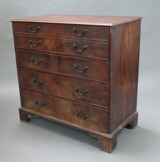 A Georgian mahogany secretaire chest, the secretaire drawer with drawers and pigeon holes above 3 long drawers with brass swan neck drop handles, raised on bracket feet 108cm h x 110cm w x 55cm d 