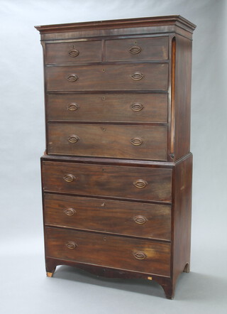 A Georgian mahogany secretaire chest on chest with moulded cornice, fitted 2 short and 3 long drawers above a secretaire drawer and 3 long drawers with replacement oval plate drop handles 196cm h x 109cm w x 54cm d 
