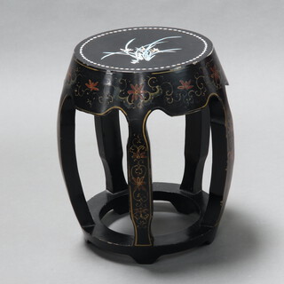 A Chinese black and floral patterned lacquered drum shaped stool 46cm h x 31cm w