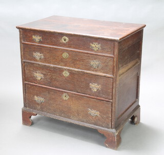 A 17th/18th Century oak mule chest with hinged lid above 2 short drawers with replacement handles, raised on bracket feet 92cm h x 94cm w x 59cm d 