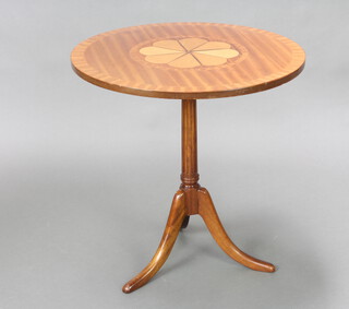 A Georgian style circular inlaid mahogany occasional table with crossbanded top, inlaid floral panel to the centre, raised on turned, fluted and tripod base 63cm h x 61cm diam. 