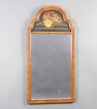 A Queen Anne style rectangular plate mirror contained in an arched walnut frame with oil on panel to the top, still life life study of flowers 78cm h x 39cm w 