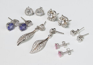 Six pairs of silver paste set earrings, 16 grams