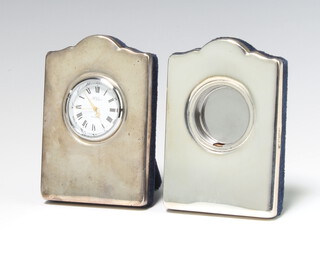 A silver bedroom timepiece Sheffield 1996 and a ditto case lacking movement 9cm 