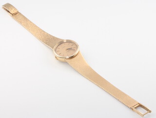 A lady's 9ct yellow gold quartz wristwatch on a ditto bracelet, bracelet including glass 23.3 grams gross 