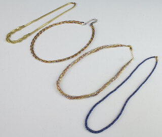 Two 9ct yellow gold necklaces 12 grams, a silver ditto 22 grams and a hardstone necklace