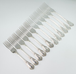 Twelve silver plated lily pattern dinner forks