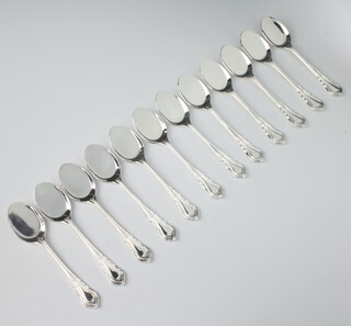 Twelve silver plated lily pattern ice cream spoons 