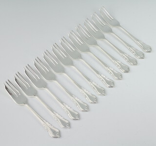 Twelve silver plated lily pattern cake forks 