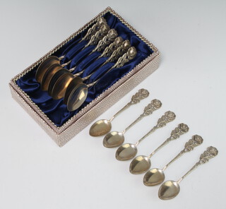 Six pierced 800 standard teaspoons decorated roses marked Antiko 800 together with 6 ditto coffee spoons 138 grams