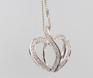 A fine 18ct white gold chain hung a pendant in the form of 2 entwined hearts, set diamonds, 7.5 grams 