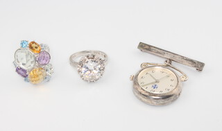 Two silver gem set rings, sizes O & P, together with a limited edition K.G.A. Nightingale watch cased