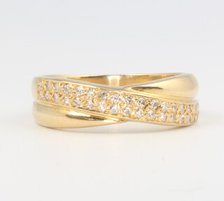 An 18ct yellow gold diamond crossover ring size P, 5.6 grams 