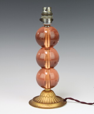 An Art Deco peach glass 3 tier bulbous table lamp with a gilt metal base 27cm 