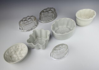 A Shelley white glazed jelly mould 11cm, 3 others and 3 glass ditto 
