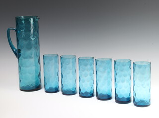 A 1960's turquoise glazed jug with 6 tumblers