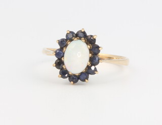 A 9ct yellow gold cluster ring, size M, 1.6 grams