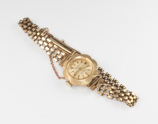 A lady's 9ct yellow gold Winegartens wristwatch on a ditto bracelet, gross weight 11 grams 