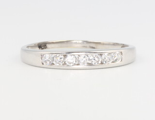 A 9ct white gold paste set half eternity ring, 2.1 grams, size T 