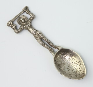 A Victorian novelty silver caddy spoon in the form of a pierrot, London 1881, 46 grams, 11cm 