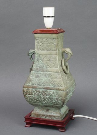 A reproduction Chinese bronze twin handled urn of club form converted to a table lamp, on a hardwood base 33cm h x 14cm w x 12cm d 
