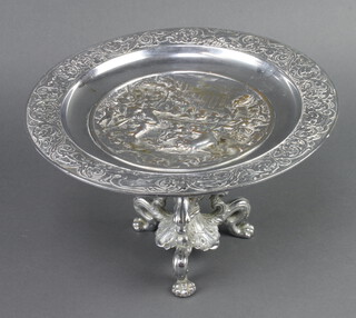 A Victorian circular chromium plated tazza decorated a classical scene, raised on scroll feet 18cm x 29cm  