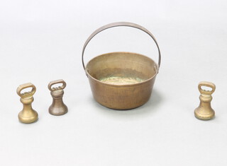 A 19th Century brass and iron preserving pan 11cm x 22cm together with 3 brass 2lb bell weights 