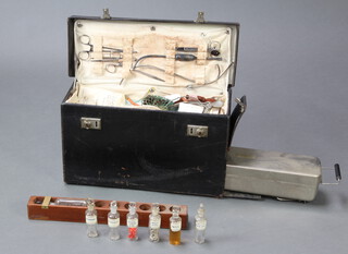 A Midwifery delivery kit comprising forceps and medical equipment, cased 