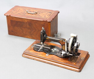 Robert Reid, a German made manual sewing machine no.256422 complete with carrying case (lid to bobbin box missing) 