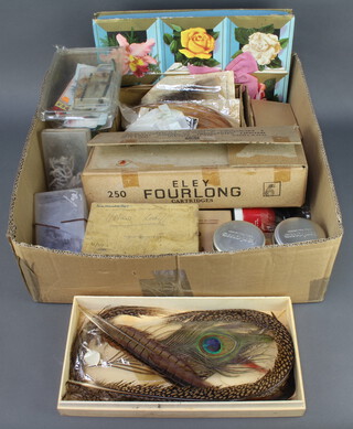 A collection of Edwardian and later fly fishing tying materials including cylindrical Farlows tins 