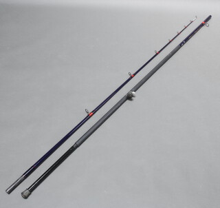 A Special Edition Century Compressor 13'6" beach casting fishing rod with reducer, coaster reel fittings, contained in original cloth bag  
