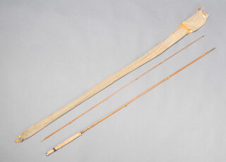 An Edgar Sealy 9' two piece split cane fly fishing rod, "The Specialist" contained in an Edgar Sealy cloth bag 