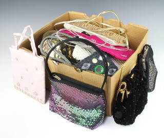 A collection of twenty four ladies evening bags together with 3 purses 
