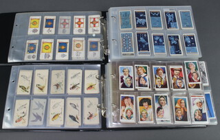 A collection of various Wills, Players and Ogdens cigarette cards contained in 2 albums  