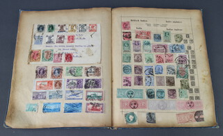 A 19th/20th Century album of world stamps including GB Victoria and later, Argentina, USA 