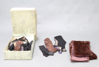 A mink stole together with various fur collars and trims contained in a Harrods box 