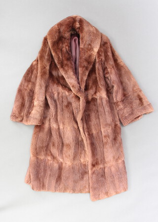 A lady's full length mink coat by John Dunn & Sons of Dorking (some moth) 
