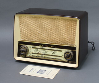 An EKCO Model U319 radio complete with instructions, original receipt and radio licence  