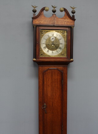 An 18th Century 8 day striking longcase clock, the 31cm brass dial with silvered chapter ring, Roman numerals, subsidiary second hand and calendar aperture, striking on bell, contained in an oak case, complete with pendulum and weights 209cm h x 44cm w x 23cm d 