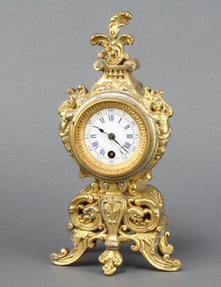 A 19th Century French timepiece with painted dial and Roman numerals, contained in a gilt metal case, the back plate marked 88683 24cm h x 13cm w x 6cm d complete with pendulum 