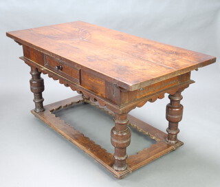 A 18th Century Dutch style rectangular table fitted 1 long drawer, the top formed of 4 planks, raised on cup and cover supports with wavy stretcher, the sides marked 1640 B.BJ AG LKO I RYOMGAARD and to the end 1915 B.BORD Q AA OVERGAAPD 82cm h x 161cm l x 78cm w 