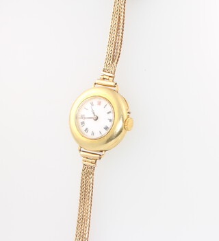 A lady's 18ct yellow gold wristwatch with red 12, contained in a 28mm case on a 9ct yellow gold strap 27 grams gross