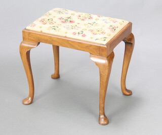 A Queen Anne style walnut dressing table stool with Berlin woolwork seat, raised on cabriole supports 45cm h x 48cm w x 35cm d  