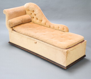 A Victorian ottoman day bed with scroll back and hinged lid, upholstered in gold material 80cm h x 170cm w x 63cm d (seat 150cm x 52cm) 